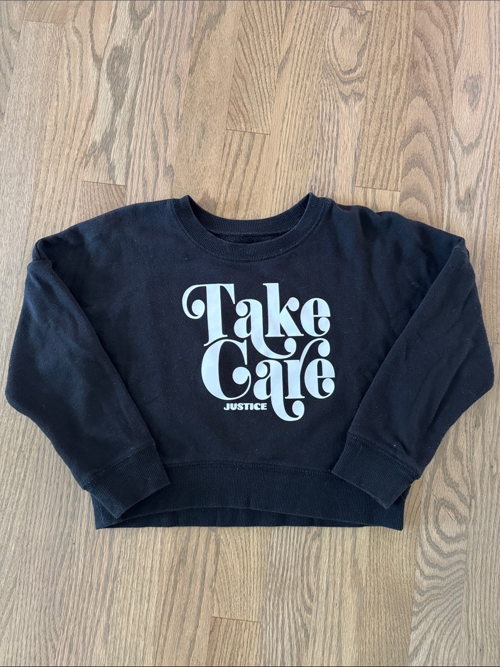 Justice Black Sweatshirt with White "Take Care" Graphic